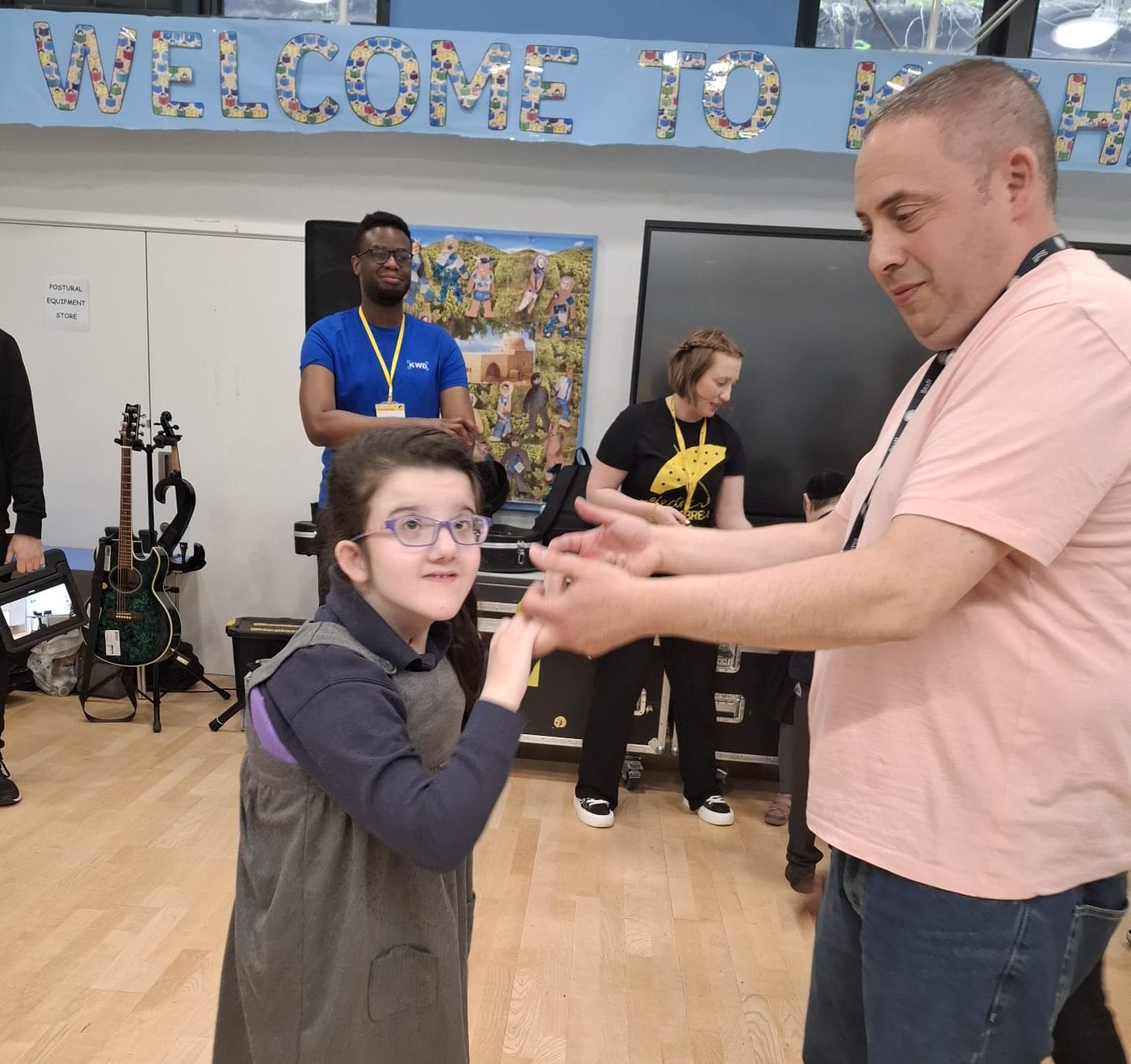 A teacher supporting a student at Kisharon Langdon