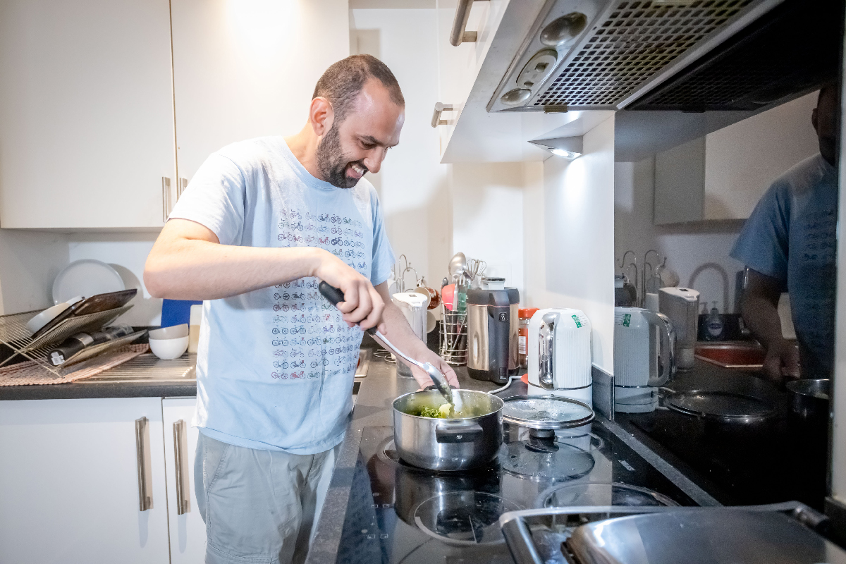 A Kisharon Langdon member cooking independently in their own home